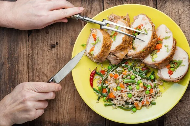 A colorful plate filled with various vegetables, lean protein like grilled chicken, and a small portion of whole grains, illustrating a balanced meal for diabetes management.