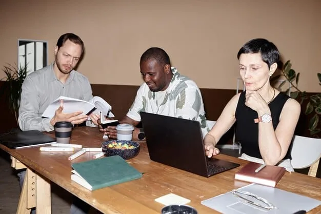 A diverse group of people, appearing concerned and thoughtful, gathered around a table reviewing documents and discussing financial implications, symbolizing the broad impact of tax changes.