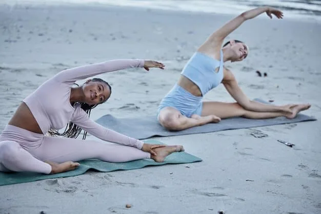 A diverse group of people engaged in low-impact exercises like yoga and swimming, illustrating methods for managing joint pain and maintaining flexibility. The mood should be supportive and active.
