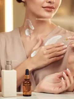 Woman applying fragrance layers for a personalized scent experience