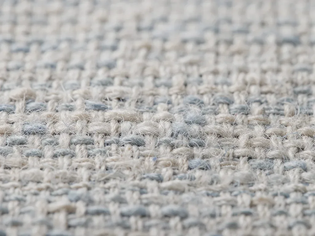 Close-up of Oxford cloth weave, highlighting 100% cotton texture and durability.