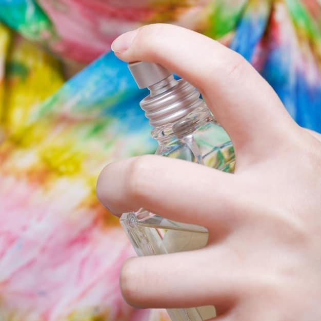 A close-up shot of a wrist with multiple layers of different fragrances sprayed on it, showcasing the technique of fragrance layering and how different scents can blend together on the skin. The focus is on the subtle interactions of the fragrances.