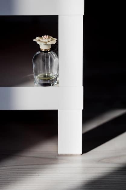 An elegant perfume collection displayed inside a climate-controlled, dark wooden cabinet with soft interior lighting. Each bottle is neatly arranged, indicating a dedicated space designed specifically for fragrance preservation and showcasing the ideal storage conditions.