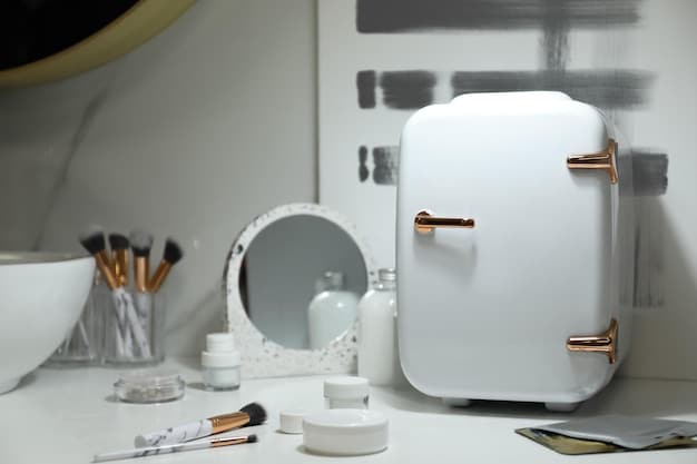 A selection of minimalist makeup products arranged neatly on a white vanity. Includes a tinted moisturizer, a cream blush, a neutral eyeshadow palette, a brow gel, and a nude lipstick. Soft morning light illuminates the products.