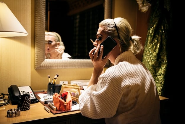 A woman applying dramatic winged eyeliner in a well-lit bathroom, with various nighttime makeup products and tools surrounding her.