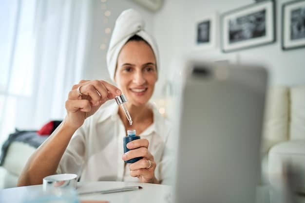 A woman applying a hydrating serum to her face, showcasing the importance of a well-hydrated skincare routine. The background is clean and minimalist, emphasizing the act of skincare.