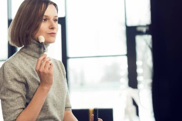 A woman applying translucent powder lightly with a large brush, focusing on her T-zone. The image highlights the difference between lightly powdered skin and skin with excessive powder.