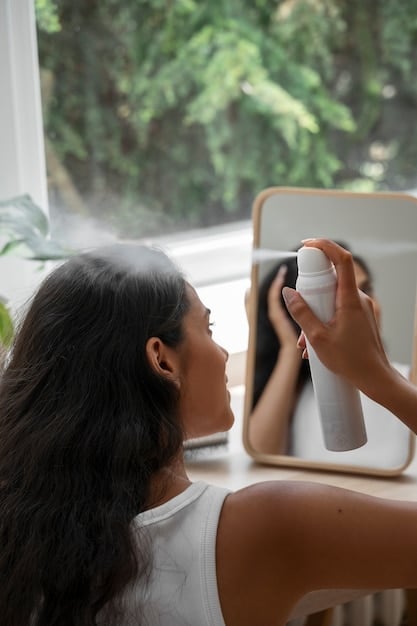 Close-up shot of a person with oily skin applying a mattifying setting spray on their face. The focus is on the fine mist and the reduction of shine.