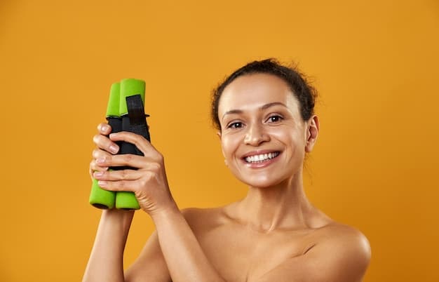 A woman with dry skin smiling as she applies a hydrating setting spray, highlighting the dewy and radiant finish it gives to her skin.