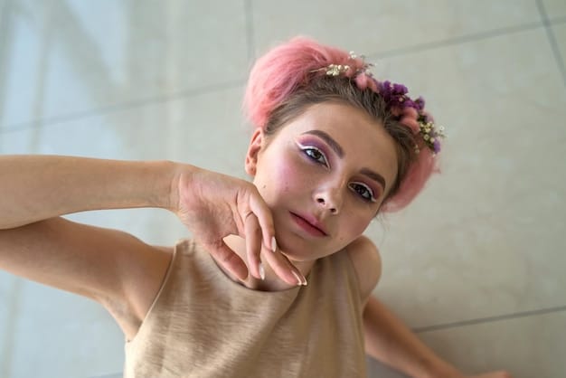 An influencer poses, wearing a full pastel makeup look, she is wearing soft lavender eyeshadow with light pink lipgloss.