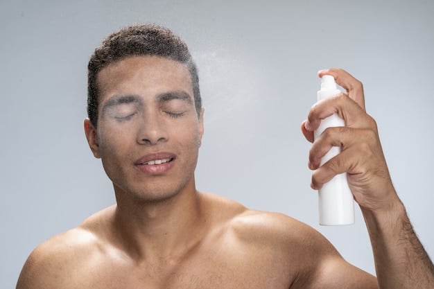 A person spraying setting spray onto their face with their eyes closed. The setting spray bottle is partially visible in the frame.