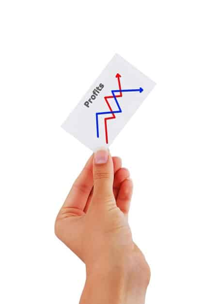 A close-up of a hand pointing at a financial chart showing a downward trend, representing the unemployment rate drop and its impact on economic indicators.