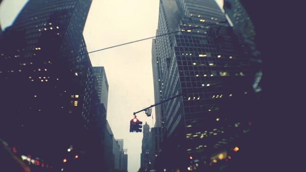A symbolic image of a financial tightrope walker against a backdrop of housing, representing the careful balance of the US housing market navigating economic challenges.