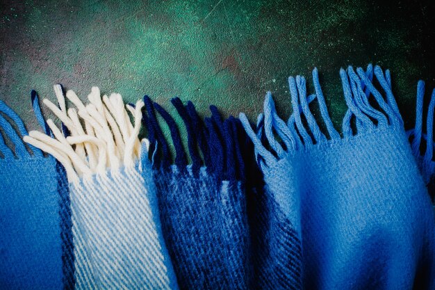 A close-up of different fabric swatches (e.g., a textured tweed, a crushed velvet, a sturdy denim) arranged to show their tactile qualities, hinting at translation possibilities.