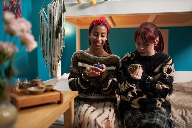 A diverse group of people engaged in a casual and friendly discussion, one person wearing a soft pink scarf, another with a purple accessory, creating an atmosphere of warmth and collaboration.