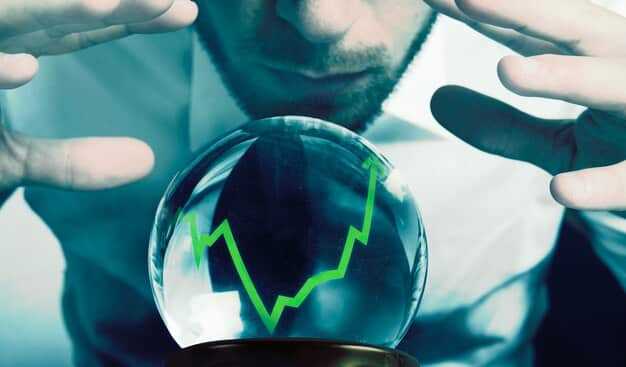 A person holding a crystal ball, looking at a blurred economic chart, signifying uncertainty about future economic trends and inflation.