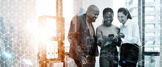 A diverse group of professionals collaborating in a modern office space, with abstract digital interfaces projected around them, symbolizing human-AI synergy in economic development. The focus is on collaboration and innovation.