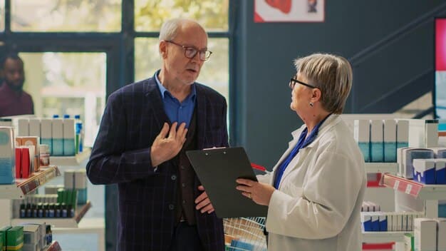 A healthcare professional (pharmacist or nurse) explaining medication details to an elderly patient in a pharmacy setting, emphasizing communication.