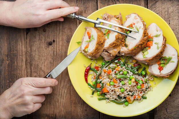 A colorful plate filled with various vegetables, lean protein like grilled chicken, and a small portion of whole grains, illustrating a balanced meal for diabetes management.