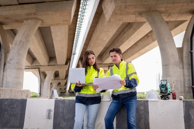 Construction workers collaborating on a bridge construction project in the USA, showing the job creation aspect of the US Infrastructure Bill: Tracking the First 100 Days of Project Implementation.