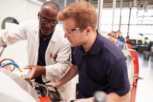 A group of adults engaged in a vocational training workshop, learning practical skills for a new industry with modern equipment.