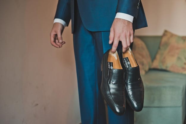 A close-up shot of a person's neatly polished dress shoes and well-fitted dress pants, symbolizing attention to detail and professionalism in interview attire. The focus is on conveying a sense of preparation and respect for the interview process, in the context of understanding How to Dress for a Job Interview: A Style Guide for Making a Lasting Impression.