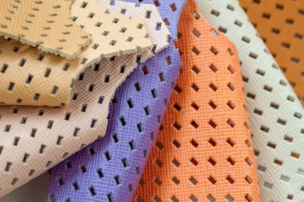 A close-up of two different patterned fabrics juxtaposed to illustrate scale and proportion. One fabric features large floral prints, while the other has smaller polka dots. The image highlights the contrast in size and how the smaller print complements the larger one without overpowering it. This visual aid reinforces the concept of balancing different scales when mixing prints successfully.
