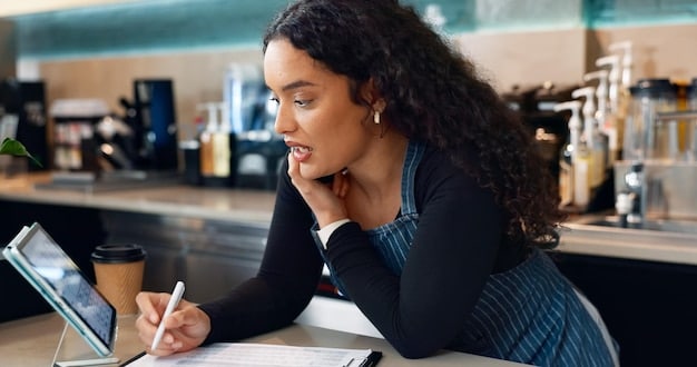 A photograph of a small business owner looking concerned while reviewing financial documents. The setting is a modestly furnished office with a computer displaying graphs showing declining sales. The image captures the anxiety and stress faced by US businesses due to 'The Impact of Global Trade Tensions on the US Economy: A Comprehensive Overview.'