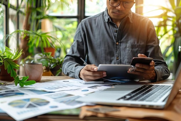 A small business owner reviewing financial reports with an accountant, illustrating the importance of financial planning and management.
