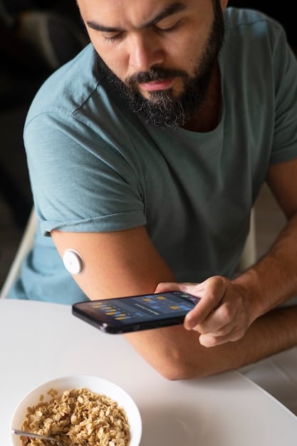A close-up shot of a person using a continuous glucose monitor (CGM) on their arm, with a smartphone displaying real-time blood sugar readings. The image highlights the role of technology in modern diabetes management and relates to The Updated US Guide to Managing Type 2 Diabetes: What's Changed in the Last 3 Months?.