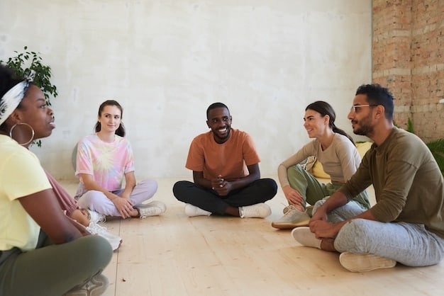A diverse group of people participating in a guided meditation session in a bright and airy studio. The instructor is leading the session with a calm demeanor, and participants are shown with their eyes closed, practicing mindfulness. Soft lighting and minimalist décor enhance the serene atmosphere. The image represents a practical application of mindfulness for anxiety reduction.