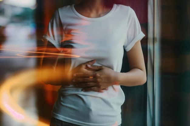 A person holding their stomach in discomfort, indicating digestive problems caused by stress, with blurred office background. This image illustrates 'The Impact of Stress on Your Health: 5 Practical Ways to Manage Stress Effectively' by highlighting a specific physical symptom.