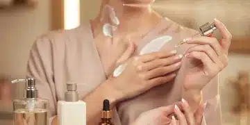 Woman applying fragrance layers for a personalized scent experience