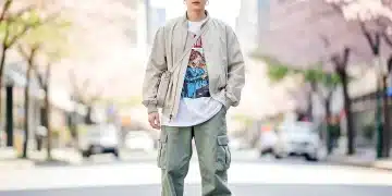 Stylish streetwear layering for spring 2026 featuring light jacket and graphic tee